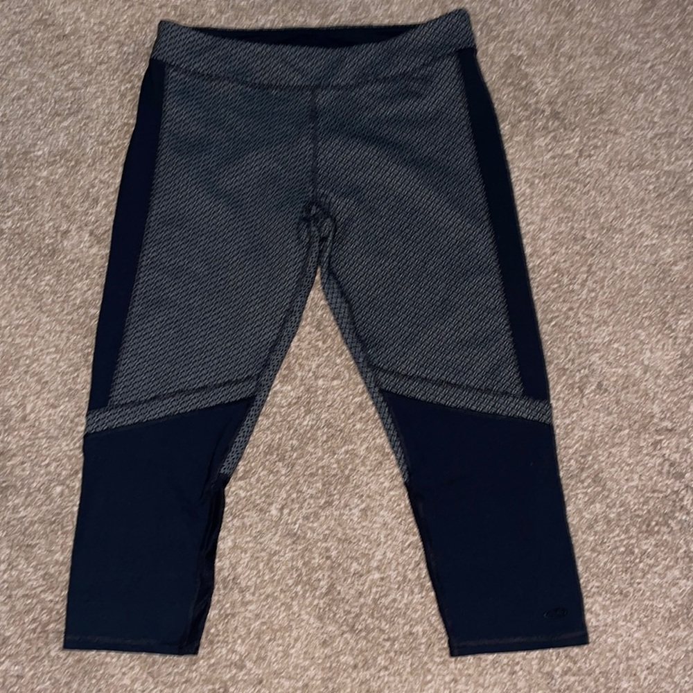 Champion brand athletic leggings. Black and grey patterned design. Size large.